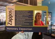 Caitlin Montalvo holding the 10 Core Values sign at Zappos